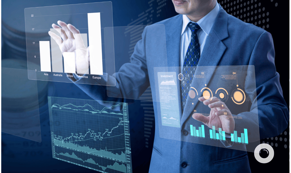 A businessman in a blue suit interacting with holographic financial charts and data visualizations.
